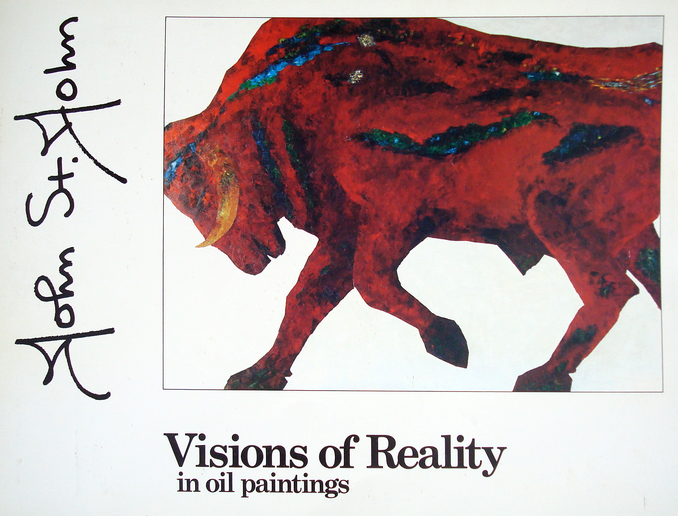 book by John St. John with bull painting on front